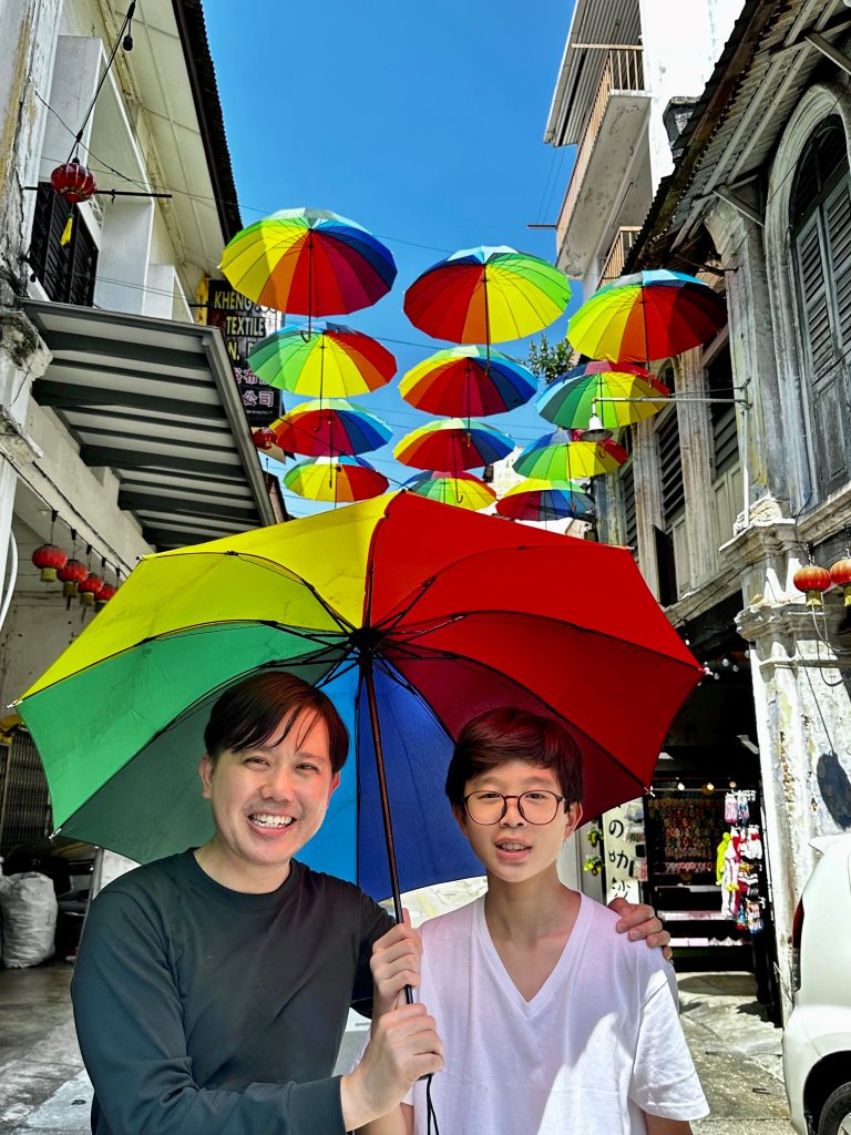 Dennis Loh, Social Worker, with his son